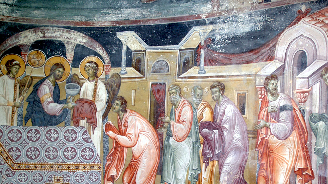 Jesus serves communion to disciples